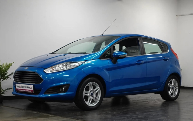 Ford Fiesta cena 26900 przebieg: 166556, rok produkcji 2013 z Wołów małe 781